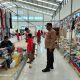 Binmas Polsek Sajoanging Polres Wajo Monitoring dan Pengamanan di Pasar Rakyat Jalang