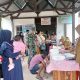 Babinsa Kelurahan Wala Serka Irwan Dike Mendampingi Tim Kesehatan Melaksanakan Kegiatan Posyandu dan Posbindu