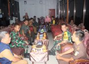 Kolonel Inf Marthen Pasunda Bertukar Pikiran dengan Pejabat Forkopimda dan Perangkat Desa Kalempang tentang Manfaat dan Pemeliharaan Hasil Pekerjaan TMMD