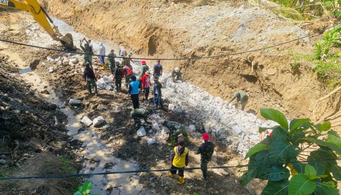 Perkuatan Talud Sungai Kalempang oleh Anggota Satgas TMMD Ke 118 Kodim 1420/Sidrap Mulai Tunjukkan Hasil Positif
