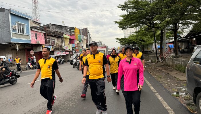 Olahraga Pagi Bersama Kapolres Gowa dan Ketua Bhayangkari: Meningkatkan Kekompakan dan Kebugaran
