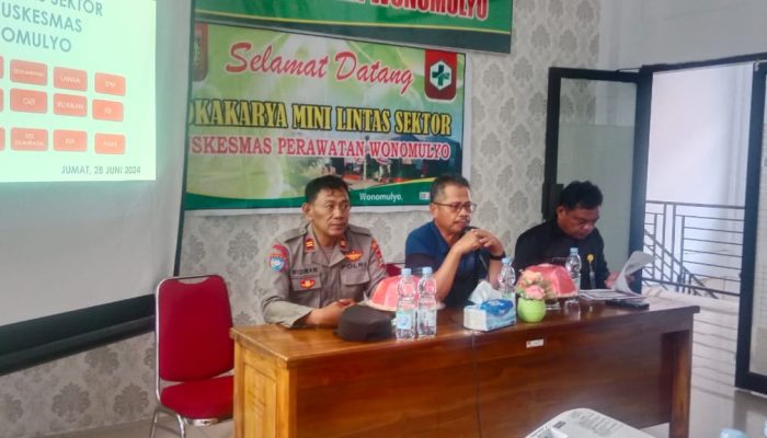 Kanit Binmas Polsek Wonomulyo Hadiri Pertemuan Lintas Sektoral UPTD Puskesmas Wonomulyo