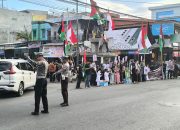 Puluhan Personel Polres Majene Amankan Aksi Damai Aliansi Gema Peduli Palestina di Tugu Juang
