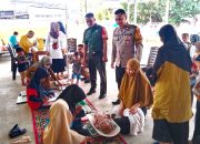 Bhabinkamtibmas Kelurahan Banggae Kolaborasi Babinsa Bentuk Sinergitas TNI-Polri Dukung Program Penanganan Stunting di Posyandu Lestari