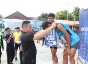 Lomba Lari Sambil Pikul Beras 5 Kg Warnai Rangkaian Peringatan HUT Lalu Lintas ke-69 Di Majene