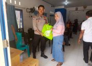 Bhabinkamtibmas Desa Bonde Utara Dampingi Penyaluran Bantuan Pangan untuk Atasi Stunting