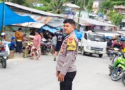 Personil Polsek Mambi Polres Mamasa Amankan Aktivitas di  Pasar untuk Jaga Ketertiban dan Kelancaran