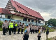 Personel Polres Mamasa Bersama Personel Porsonel Polsek Mambi Laksanakan Apel Kesiapan Pengamanan Malam Pergantian Tahun 2024-2025 di Mambi