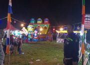 Personel Polsek Mambi Polres Mamasa Laksanakan Pemantauan Pasar Malam untuk Jaga Keamanan dan Ketertiban