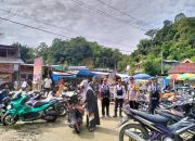 Personel Polsek Mambi Laksanakan Pengamanan dan Pengaturan Lalu Lintas di Pasar Tradisional