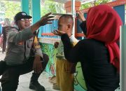 Bhabinkamtibmas Desa Bababulo Dukung Penanganan Stunting Lewat Pendampingan Posyandu Menuju Sehat