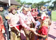 Hardiknas 2025: Kapolres Sidrap Hadiri Upacara Penuh Warna dengan Pakaian Adat