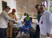 Kapolres Selayar Hadiri dan Salurkan Langsung Bantuan Beras Alokasi Juni-Juli 2025 di Bontomatene
