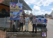 Satlantas Polres Wajo dan Jasa Raharja Pasang Spanduk Imbauan Keselamatan di Titik Rawan Laka