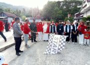 Polsek Pamboang Kawal Jalan Sehat HUT RI ke-80 di Desa Bababulo