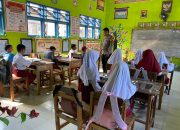 Polsek Pamboang Kawal Penyaluran Program Makanan Bergizi Gratis di SDN 06 Balombong
