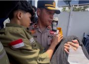 Wakapolres Parepare Gendong Mahasiswa Pingsan Saat Tengah Aksi Demo