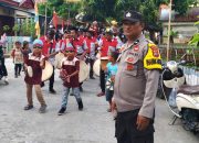 Personel Polsek Pamboang Amankan Arak-Arakan Maulid Nabi dan Pissawe Totamma di Desa Simbang