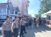 Personel Polres Majene Amankan Lomba Segitiga Perahu Sandeq pada Festival Sandeq Teluk Mandar 2025