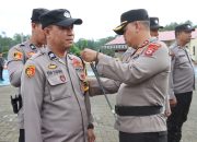 Kapolres Toraja Utara Pimpin Upacara Penyesuaian Nomenklatur dan Pemasangan Ban Lengan Pamapta