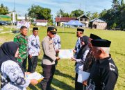 Kanit Binmas Polsek Malunda Hadiri Upacara Hari Guru Nasional di Lapangan Tasinara Malunda