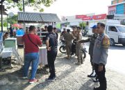 Bhabinkamtibmas Polsek Banggae Kawal Penertiban PKL di Wilayah Kelurahan Tande Timur