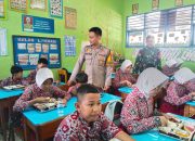 Sinergitas Bhabinkamtibmas Polsek Banggae Bersama Babinsa Dampingi Penyaluran Makanan Bergizi Gratis untuk Siswa di Kelurahan Banggae