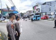 Pastikan Berjalan Kondusif, Personel Polres Majene Kawal Aksi Damai KAMRI di Bundaran Tugu Juang